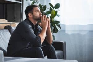 Man thinking about ways to stop overthinking